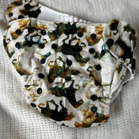 Couche à poche
