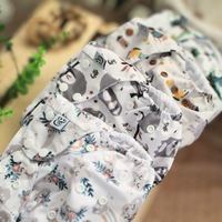 Couche à poche - Le village des chiots