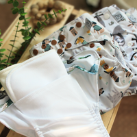 Couche à poche - Le village des chiots